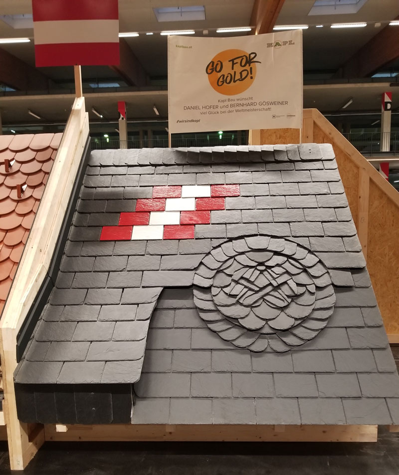 Team Austria is the gold first place steep slope roofing winner at the 2024 IFD in Innsbruck. Team Austria is the gold first place steep slope roofing winner at the 2024 IFD in Innsbruck.