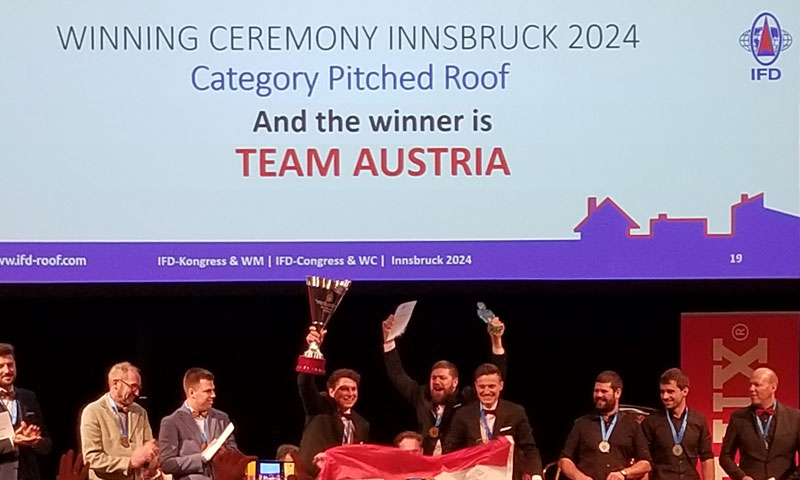 Team Austria is the gold first place steep slope roofing winner at the 2024 IFD in Innsbruck. Team Austria is the gold first place steep slope roofing winner at the 2024 IFD in Innsbruck.